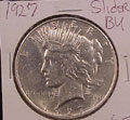 1927 Peace Dollar in Slider BU Condition